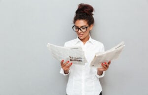 https://www.magnific.com/free-photo/cheerful-business-woman-standing-grey-wall-with-newspapers_7337953.htm#fromView=search&page=1&position=3&uuid=5e5534c7-bdaa-4fbb-804a-b26dc309b903&query=person+newspapers