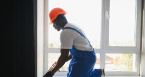 https://www.magnific.com/premium-photo/african-workman-overalls-installing-adjusting-plastic-windows-living-room-home_396463648.htm#from_element=cross_selling__photo