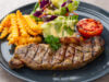 https://www.vecteezy.com/photo/49673137-grilled-sirloin-beef-steak-with-french-fries-and-salads