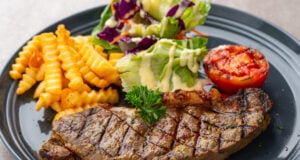 https://www.vecteezy.com/photo/49673137-grilled-sirloin-beef-steak-with-french-fries-and-salads