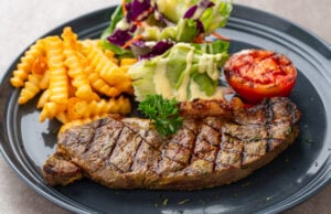 https://www.vecteezy.com/photo/49673137-grilled-sirloin-beef-steak-with-french-fries-and-salads
