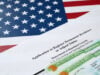 https://www.vecteezy.com/photo/14002471-i-485-application-to-register-permanent-residence-or-adjust-status-form-and-green-card-from-dv-lottery-lies-on-united-states-flag-from-department-of-homeland-security