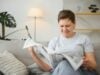 https://www.vecteezy.com/photo/39340485-middle-aged-woman-sitting-sofa-and-reading-newspapers