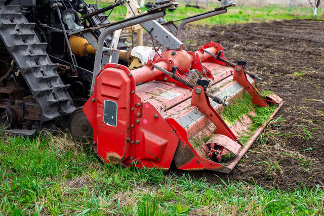 https://www.vecteezy.com/photo/72759554-red-cultivator-attached-to-a-small-tractor-digging-the-soil-in-a-farm-field