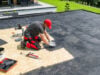 https://www.vecteezy.com/photo/67548237-roofer-applying-waterproof-membrane-on-flat-roof-during-sunny-afternoon