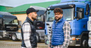 https://www.vecteezy.com/photo/74597052-truck-drivers-discussing-logistics-in-truck-parking-lot