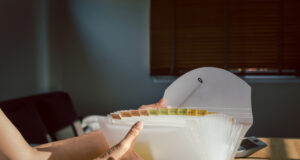 https://www.vecteezy.com/photo/21918970-woman-hands-organizing-folder-on-a-desk-at-home