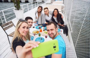 https://www.magnific.com/free-photo/happy-young-friends-were-sitting-table-having-picnic-outdoors_10141091.htm#fromView=search&page=1&position=15&uuid=4b79f54a-5593-4545-a775-f7a02e6cfe19&query=group+vactioneers+on+a+boat