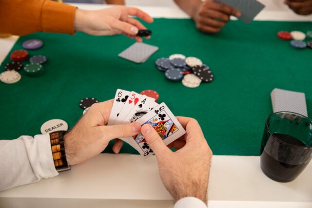 2149276063 https://www.magnific.com/free-photo/friends-playing-poker-together_22712170.htm#fromView=search&page=2&position=21&uuid=fdb5d4f4-6b3b-48ac-a75a-d5e4d3157ab8&query=poker