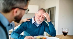 The Hidden Health Costs of Debt: Skipped Care, Headaches and Fatigue https://www.magnific.com/premium-photo/adult-hipster-son-frustrated-senior-father-indoors-home-eating-light-lunch_371870815.htm#fromView=search&page=1&position=18&uuid=9c0ee404-83b6-4164-a76a-8a0b5c0f4dd5&query=sad+senior+eating