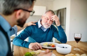 The Hidden Health Costs of Debt: Skipped Care, Headaches and Fatigue https://www.magnific.com/premium-photo/adult-hipster-son-frustrated-senior-father-indoors-home-eating-light-lunch_371870815.htm#fromView=search&page=1&position=18&uuid=9c0ee404-83b6-4164-a76a-8a0b5c0f4dd5&query=sad+senior+eating