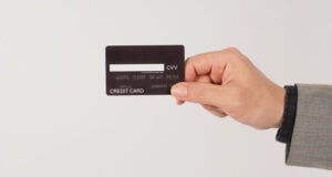 The Most Annoying Number on Your Credit Card Might Be the Most Important https://www.vecteezy.com/photo/14215212-a-hand-is-holding-back-of-black-credit-cards-and-wearing-a-suit-on-white-background