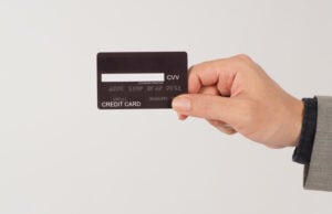 The Most Annoying Number on Your Credit Card Might Be the Most Important https://www.vecteezy.com/photo/14215212-a-hand-is-holding-back-of-black-credit-cards-and-wearing-a-suit-on-white-background
