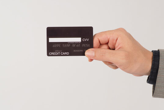 https://www.vecteezy.com/photo/14215212-a-hand-is-holding-back-of-black-credit-cards-and-wearing-a-suit-on-white-background