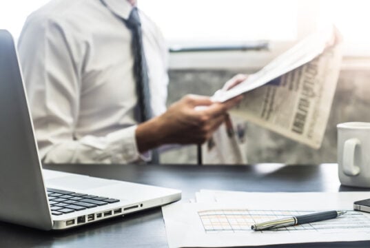 https://www.vecteezy.com/photo/10718799-businessman-reading-a-newspaper-on-the-desk-selective-focus