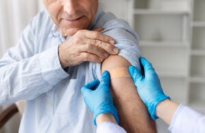 Redefining Seasonal Immunity: FDA Advisory Panel Recommends First mRNA Influenza Vaccine https://www.vecteezy.com/photo/74395127-closeup-of-senior-male-patient-with-adhesive-bandage-on-arm-after-vaccination