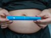 https://www.vecteezy.com/photo/77260366-glp-1-injection-pen-held-by-woman-in-front-of-abdomen-weight-management-concept
