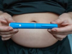 https://www.vecteezy.com/photo/77260366-glp-1-injection-pen-held-by-woman-in-front-of-abdomen-weight-management-concept