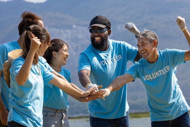 https://www.vecteezy.com/photo/40572255-team-of-young-and-diversity-volunteer-worker-group-enjoy-charitable-social-work-outdoor-together-to-saving-environment-project-wearing-blue-t-shirt-while-joining-hand-in-power-assemble-unity