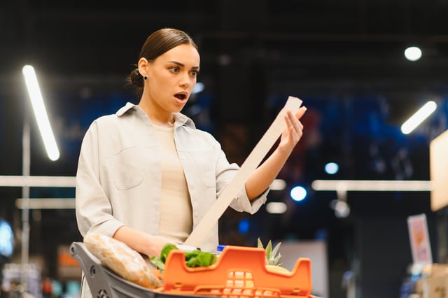 https://www.vecteezy.com/photo/78814314-woman-shocked-by-high-grocery-prices-checking-long-receipt