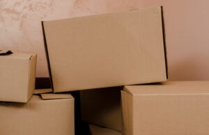 How a Stack of Cardboard Boxes Predicted the Future of the American Economy https://www.magnific.com/free-photo/stack-boxes-near-wall_1815132.htm#fromView=search&page=1&position=37&uuid=d541af68-617c-45aa-bc2d-d10f4b139361&query=cardboard+boxes