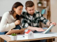 Refinancing A Mortgage: What It Means, How It Works https://www.magnific.com/free-photo/medium-shot-blurry-couple-indoors_12977478.htm#fromView=search&page=1&position=25&uuid=11c3ec77-3c4e-4ad7-9a11-5b4017379b6d&query=mortgage+refinancing