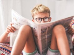 https://www.magnific.com/premium-photo/boy-reading-newspaper-home_122966661.htm#fromView=search&page=1&position=9&uuid=fa544e28-6416-4c53-9820-787fe153f8f2&query=reading+newspaper