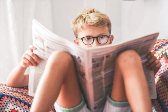 https://www.magnific.com/premium-photo/boy-reading-newspaper-home_122966661.htm#fromView=search&page=1&position=9&uuid=fa544e28-6416-4c53-9820-787fe153f8f2&query=reading+newspaper