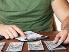 https://www.magnific.com/premium-photo/man-working-financial-report-office-closeup_40436809.htm#fromView=search&page=3&position=39&uuid=3e9d7c8f-217a-4b60-a63e-e3d99dc45cd0&query=countig+out+money+to+pay+a+bill