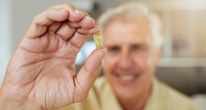 https://www.magnific.com/premium-photo/senior-man-hand-with-pill-home-medication-pharmaceutical-treatment-chronic-illness-mature-person-capsule-medicine-routine-supplement-prescription-drugs-retirement-health_361145117.htm#fromView=search&page=1&position=9&uuid=0d7fb649-244b-4fb5-8f20-cdd9ef02a26a&query=senior+vitamins