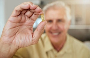 https://www.magnific.com/premium-photo/senior-man-hand-with-pill-home-medication-pharmaceutical-treatment-chronic-illness-mature-person-capsule-medicine-routine-supplement-prescription-drugs-retirement-health_361145117.htm#fromView=search&page=1&position=9&uuid=0d7fb649-244b-4fb5-8f20-cdd9ef02a26a&query=senior+vitamins