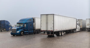 https://www.magnific.com/premium-photo/two-trucks-are-driving-road-with-word-highway-side_47091373.htm#fromView=search&page=1&position=46&uuid=777fdc3f-0a21-4459-ac2d-a06286eab6c9&query=18-wheeler+parked