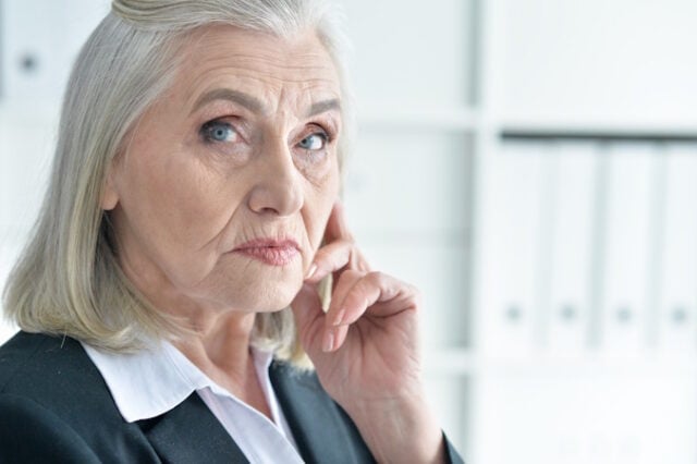 Emotional old businesswoman in office posing in front of camera https://www.magnific.com/premium-photo/emotional-old-businesswoman-office_57344153.htm#fromView=search&page=2&position=5&uuid=381c27f3-6739-4073-b3cb-220002f4c214&query=senior+person+distracted+stare