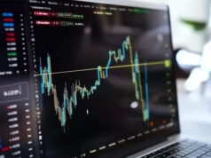 https://www.vecteezy.com/photo/65826185-a-laptop-with-a-stock-market-chart-on-it