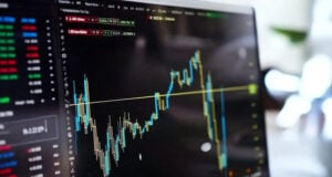 https://www.vecteezy.com/photo/65826185-a-laptop-with-a-stock-market-chart-on-it