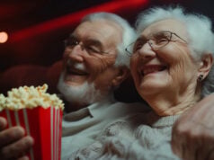 How Catching A Movie Or Visiting A Museum May Keep Your Body Younger https://www.vecteezy.com/photo/58531165-an-elderly-couple-sitting-in-a-theater-with-popcorn