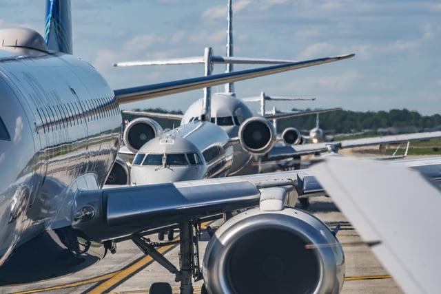 busy airport tarmac traffic before airplanes take off https://www.vecteezy.com/photo/3081944-busy-airport-tarmac-traffic-before-airplanes-take-off
