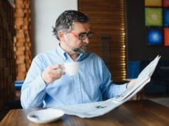 https://www.vecteezy.com/photo/39336651-closeup-portrait-of-serious-senior-handsome-man-reading-newspaper-having-coffee-break-and-sitting-at-table