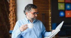 https://www.vecteezy.com/photo/39336651-closeup-portrait-of-serious-senior-handsome-man-reading-newspaper-having-coffee-break-and-sitting-at-table