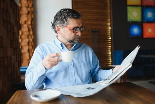 https://www.vecteezy.com/photo/39336651-closeup-portrait-of-serious-senior-handsome-man-reading-newspaper-having-coffee-break-and-sitting-at-table