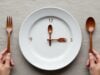 https://www.vecteezy.com/photo/74106995-intermittent-fasting-concept-with-white-plate-and-wooden-cutlery-clock