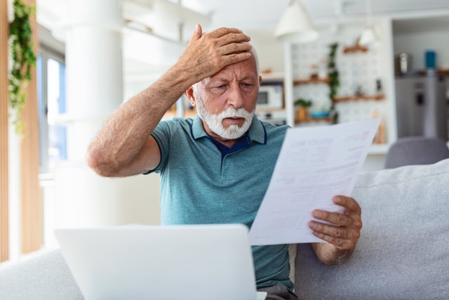 man worried about his monthly payments. Serious senior man holding letter feels interested read business news, got invitation, learns bank statement information. Postal correspondence concept https://www.vecteezy.com/photo/39952737-man-worried-about-his-monthly-payments-serious-senior-man-holding-letter-feels-interested-read-business-news-got-invitation-learns-bank-statement-information-postal-correspondence-concept
