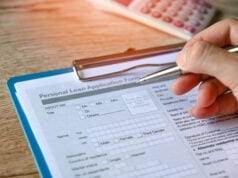 https://www.vecteezy.com/photo/8369308-personal-loan-concept-with-loan-application-form-paper-with-calculator-and-business-manholding-a-penclient-signs-loan-on-the-table-loan-business-finance-economy-commercial-real-estate-investments