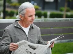 Florida Newspaper Front Pages https://www.vecteezy.com/photo/45671429-portrait-of-senior-man-reading-on-bench-during-summer-day