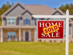 Thinking of Buying a Home Now and Refinancing Later? Here’s Why That Strategy Could Backfire https://www.vecteezy.com/photo/16358621-sold-home-for-sale-sign-in-front-of-new-house
