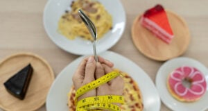 https://www.vecteezy.com/photo/17154865-tape-measure-around-the-arms-of-women-stop-eating-trans-fats-spaghetti-donuts-waffles-and-sweets-lose-weight-for-good-health-top-view-diet-concept