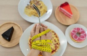 https://www.vecteezy.com/photo/17154865-tape-measure-around-the-arms-of-women-stop-eating-trans-fats-spaghetti-donuts-waffles-and-sweets-lose-weight-for-good-health-top-view-diet-concept