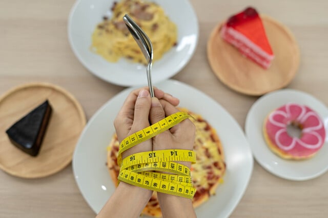 https://www.vecteezy.com/photo/17154865-tape-measure-around-the-arms-of-women-stop-eating-trans-fats-spaghetti-donuts-waffles-and-sweets-lose-weight-for-good-health-top-view-diet-concept