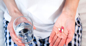 https://www.vecteezy.com/photo/40163412-young-woman-holds-two-pills-and-glass-of-water-in-hands-taking-vitamins-supplements-antibiotic-antidepressant-painkiller-medication-prenatal-vitamins-close-up