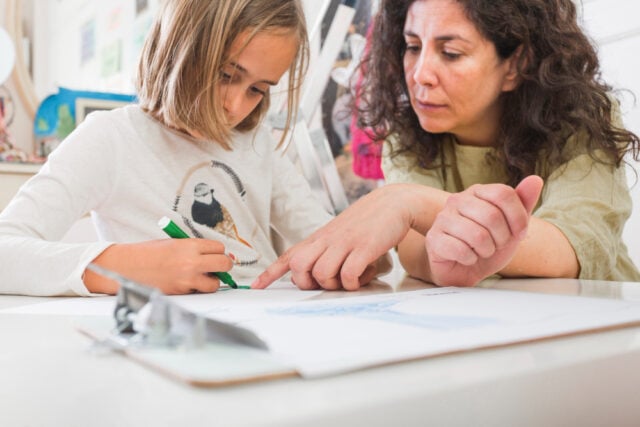 2147848703 https://www.magnific.com/free-photo/mother-helping-girl-with-drawing_2483401.htm#fromView=search&page=1&position=45&uuid=773f7acb-fed7-459f-b02d-e5920d6ba805&track=ais_hybrid&query=special+ed+class